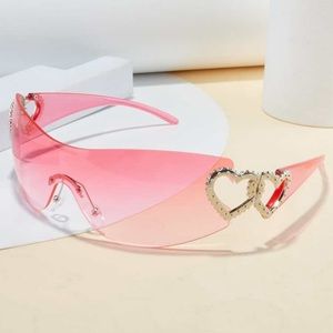 Pink sunglasses with heart hardware